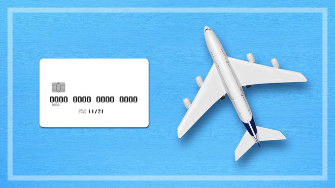 travel money card next to model plane